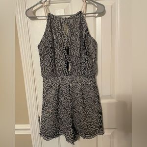 Blue and Black lace romper from Charolette Russe. Size small.